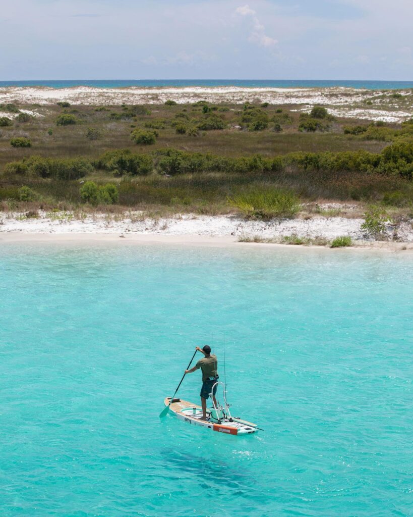 BOTE Rackham Bug Slinger with a fisherman in the ocean